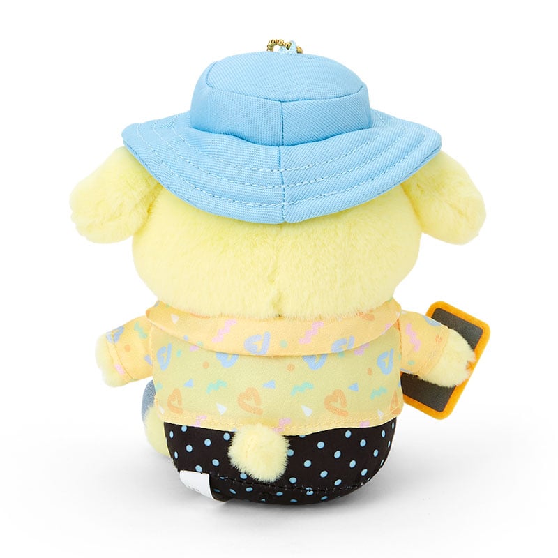 Pompompurin plush keychain hanging from a bag strap