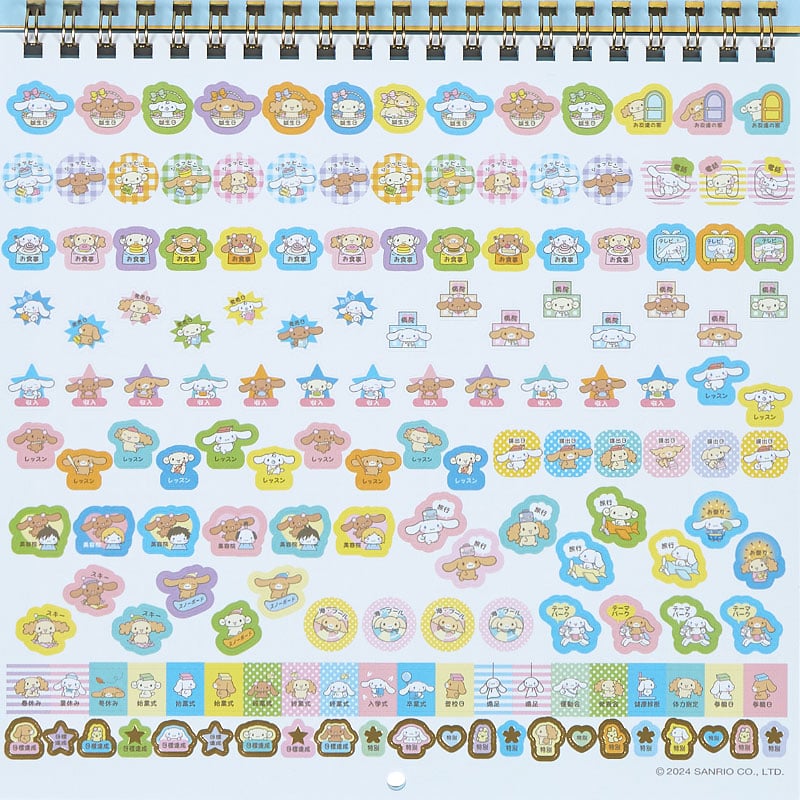 Close-up of the 2025 calendar showing monthly layouts and character art.