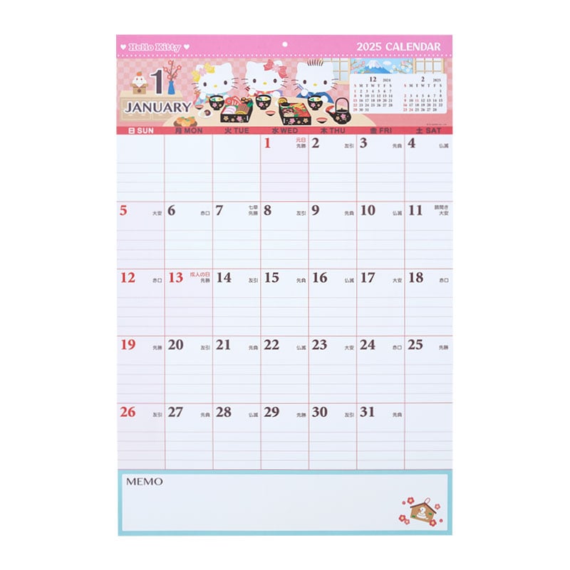 Close-up of Hello Kitty wall calendar with memo pad for planning.