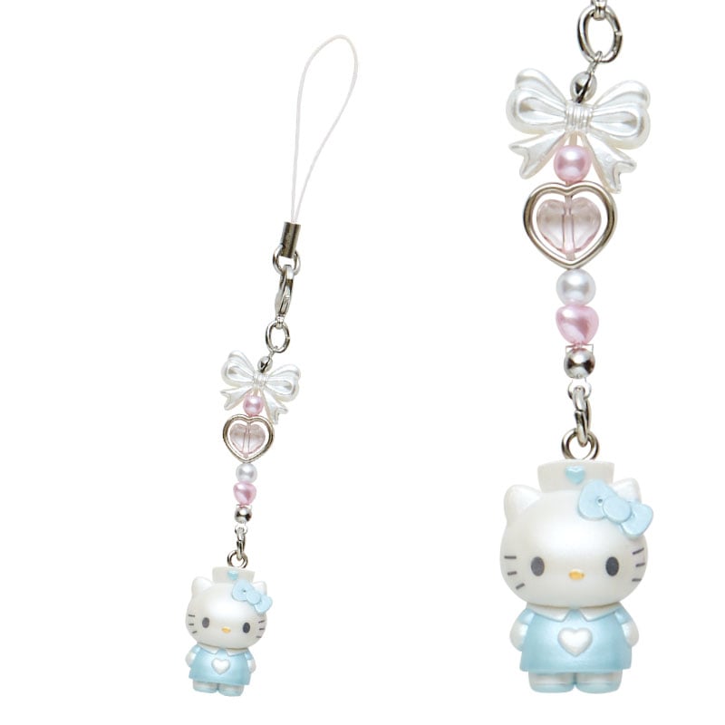 Close-up of Hello Kitty smartphone charm showing vibrant colors and details.