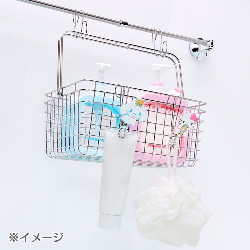 Front view of Hello Kitty mascot soap dispenser with clear bottle in bathroom setting