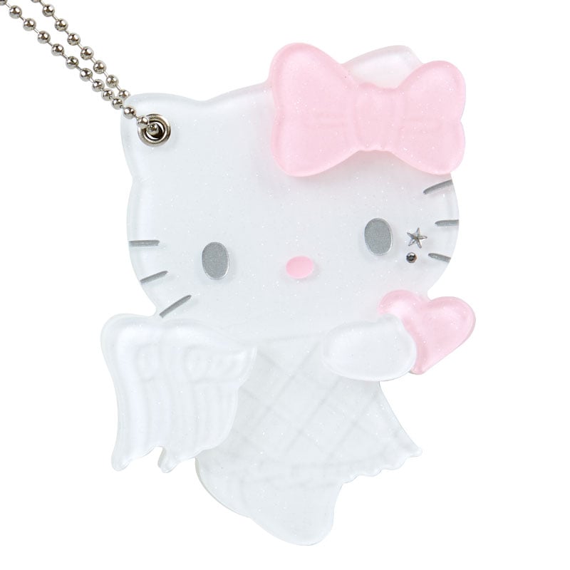 Hello Kitty sliding mirror in hand, demonstrating size