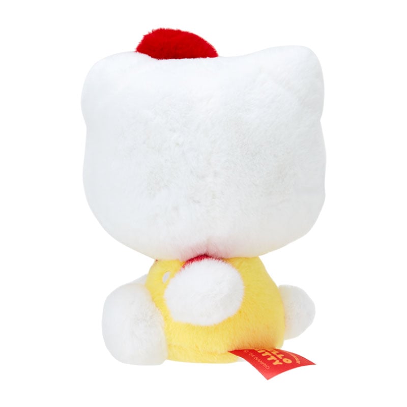 Vivid yellow Hello Kitty plush mascot with embroidered details and anniversary tag