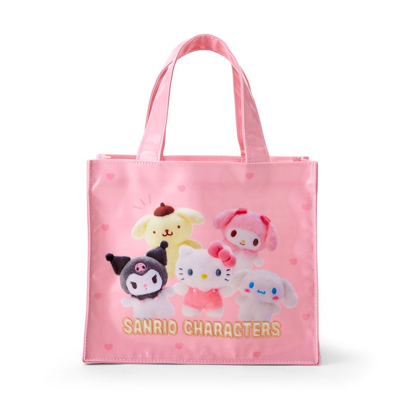 Angled front view of Sanrio mini bag featuring Hello Kitty charms