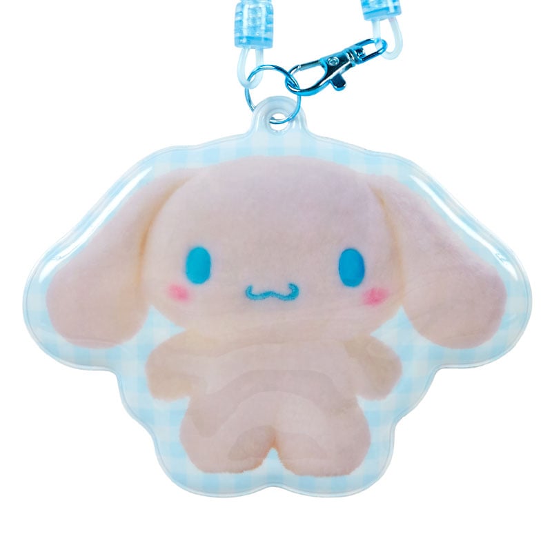 Stylish Cinnamoroll badge worn on a backpack for everyday use
