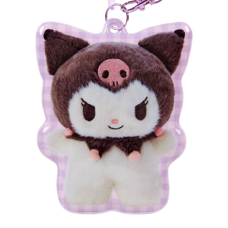 Kuromi ID holder in use, hanging from a bag during a day out.