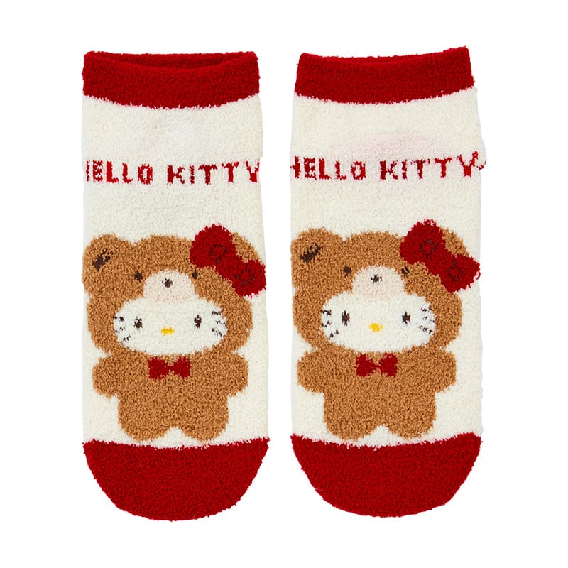 Front view of red Hello Kitty socks with teddy bear ears peeking over ankle