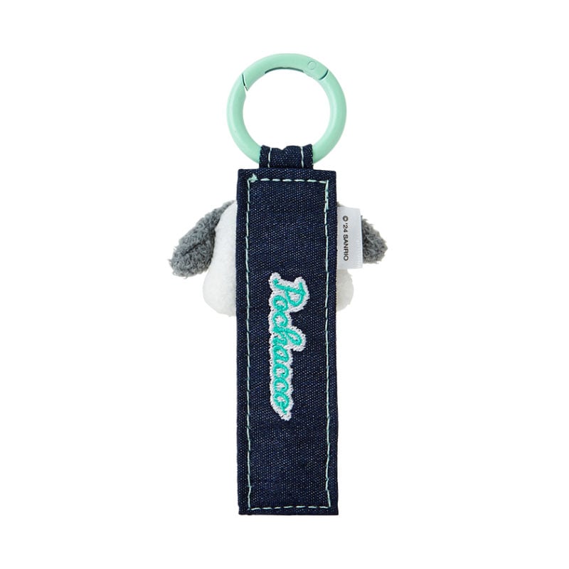 Close-up of the embroidered Pochacco mascot on the denim patch keychain