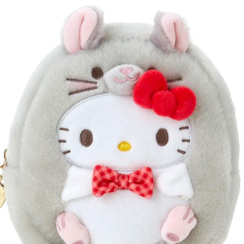 Close-up of the Hello Kitty pouchs embroidered details and internal pocket.