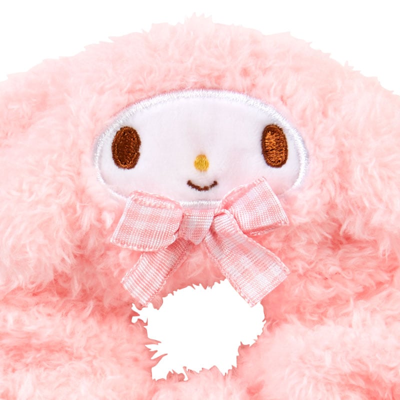 Close-up of the embroidered details on the plush scrunchie