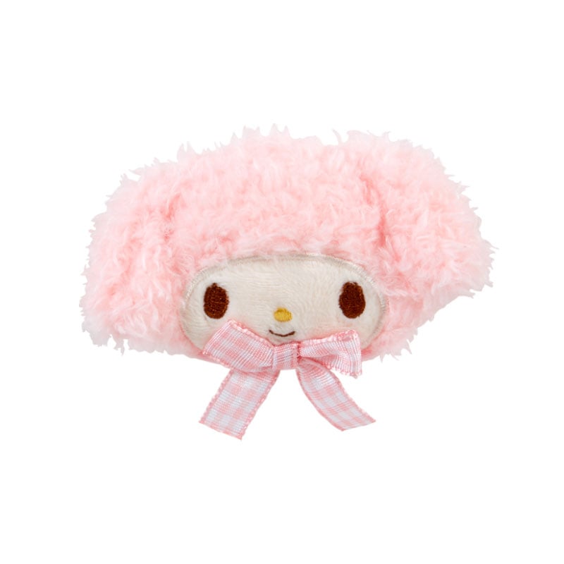 My Melody hair clip worn on a messy bun, showcasing its non-toothed duckbill clip