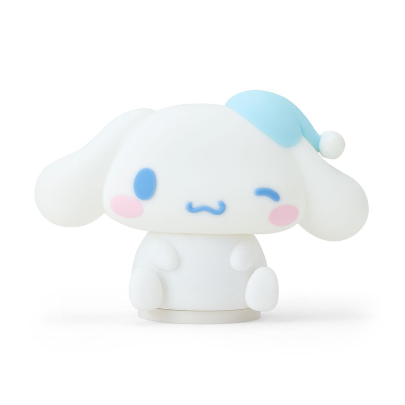 Cinnamoroll plush nightlight turned on, showing 3 different brightness levels