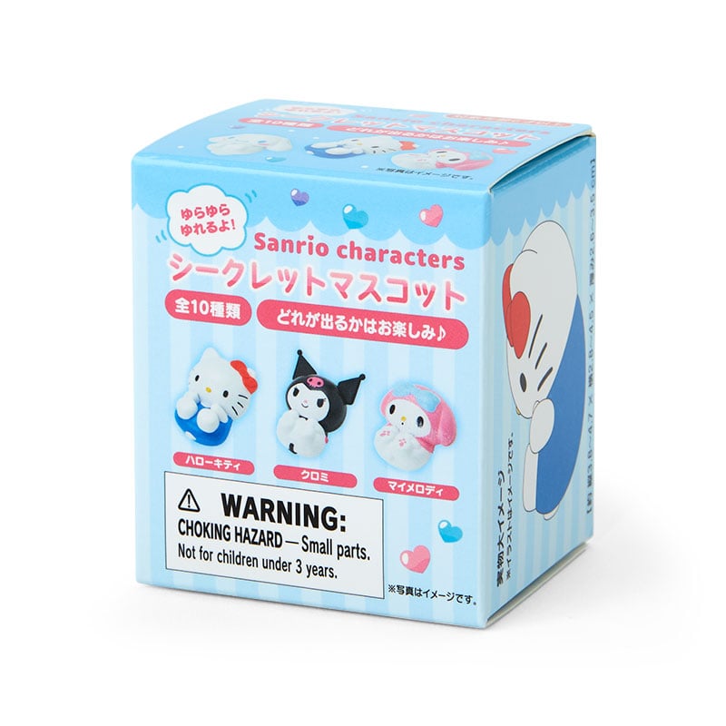 Unboxing a MINISO Sanrio blind box to reveal a roly poly mascot