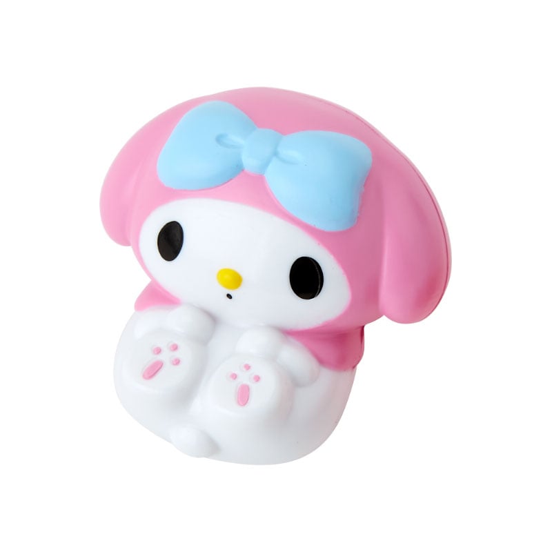 Unboxing a MINISO Sanrio blind box to reveal a roly poly mascot