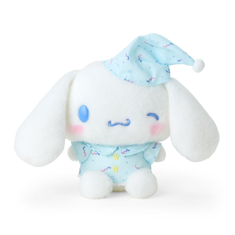 Front angle of Cinnamoroll plush toy with sleepwear, showing hand-painted cheeks