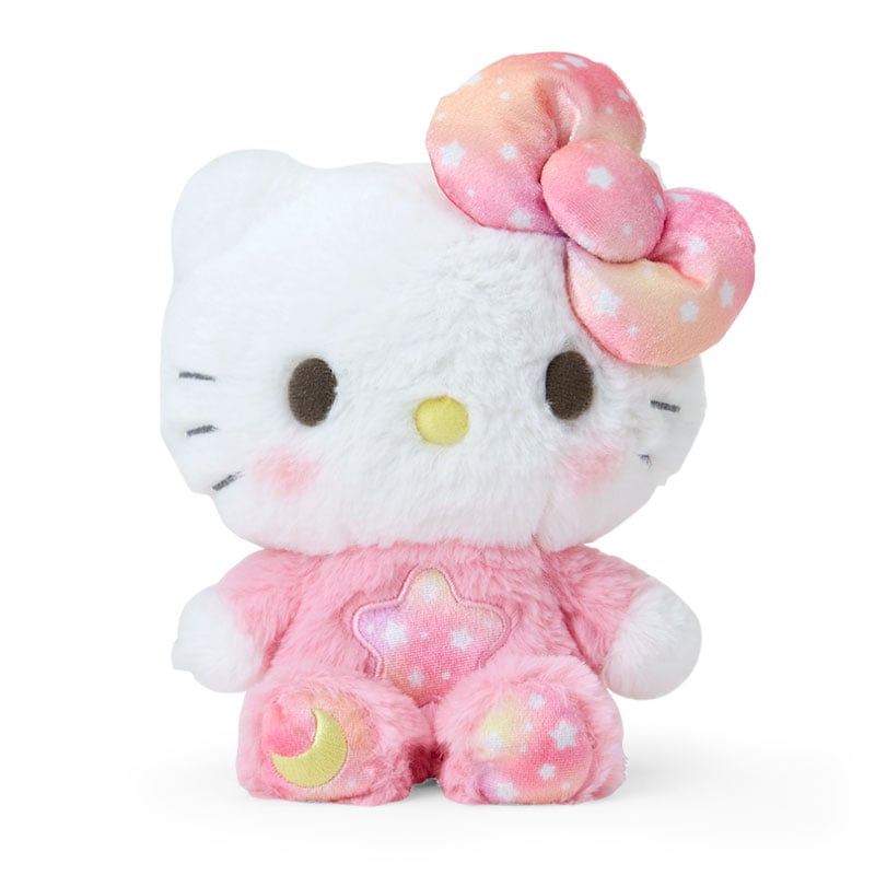 Front view of the Celestial Hello Kitty plush toy with star and moon patch.