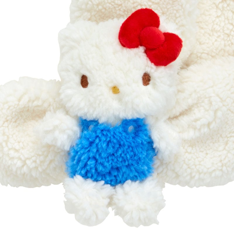 Detailed view of the embroidered details on the cozy cat wraps.