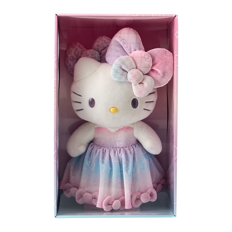 Hello Kitty 50th Anniversary collectible plush, side view showing mini bows on party dress