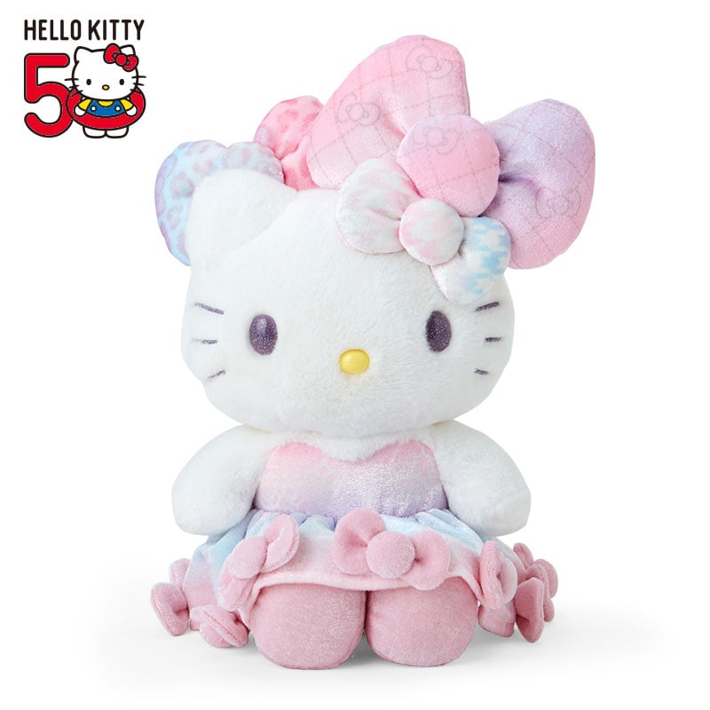 Close-up of Hello Kitty plush showing intricate ribbon details and embroidered eyes