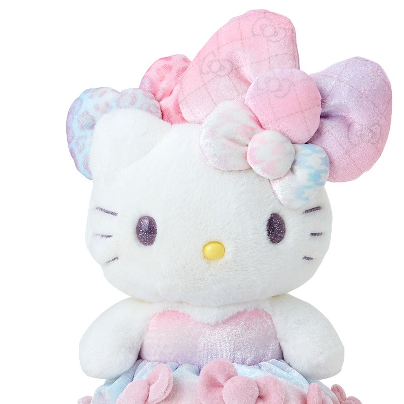 Hello Kitty plush displayed on a shelf with other collectible plush toys