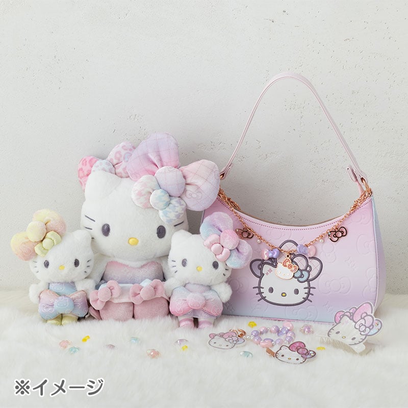 Side view of the Hello Kitty plush showcasing its soft fabric and bow accents