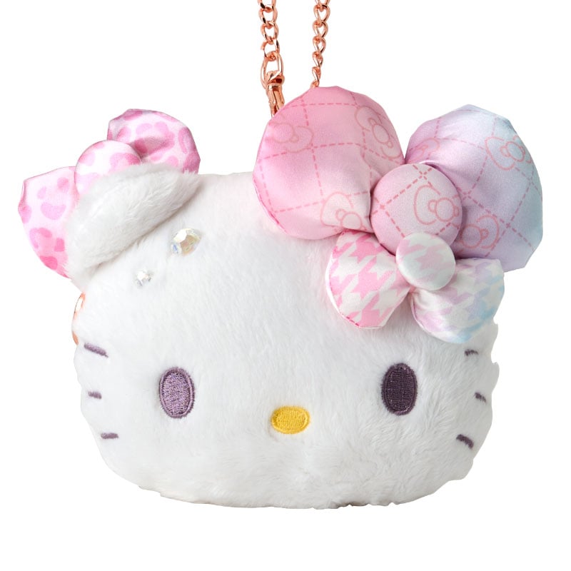 ID card holder featuring Hello Kitty’s signature style with bow accents and lobster clasp chain