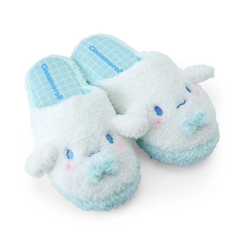 Close-up of Cinnamoroll plush sherpa slippers showing embroidered face details Close-up of Cinnamoroll plush sherpa slippers showing embroidered face details