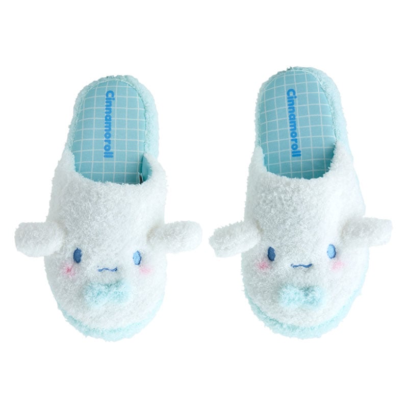 Adult feet resting on non-slip Cinnamoroll slippers for indoor comfort