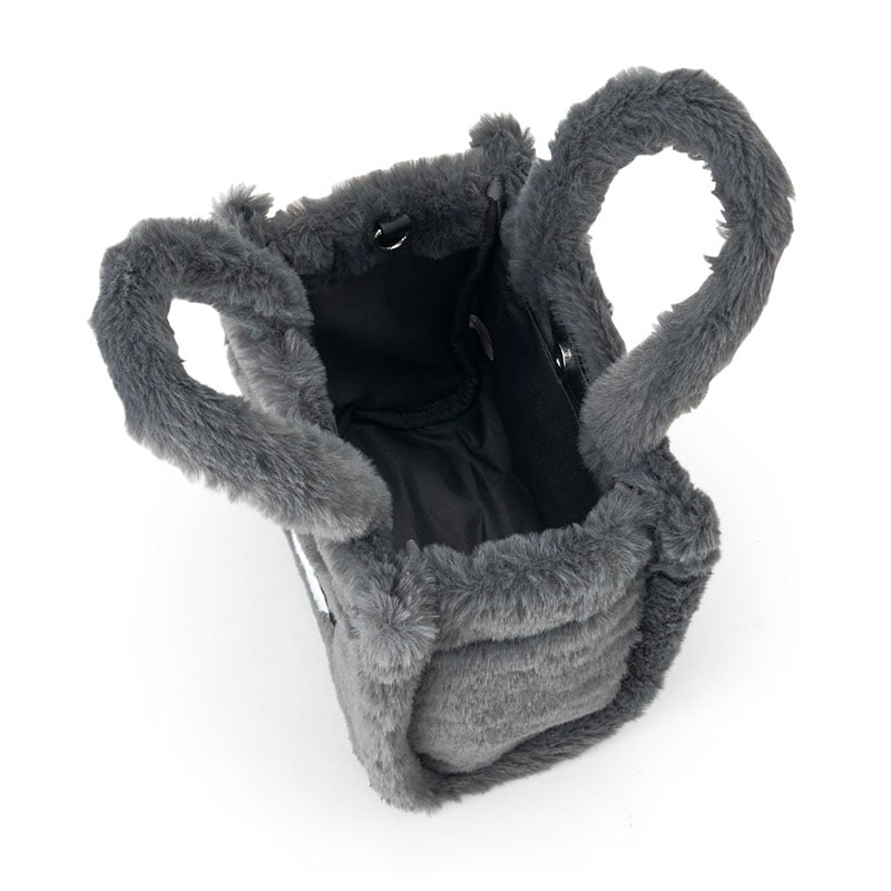 Kuromi mini tote worn crossbody, perfect for lightweight travel or errands