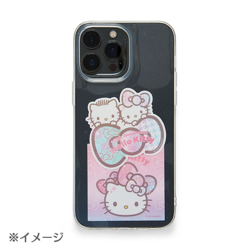 Close-up of the Hello Kitty cosmetic pouch with holographic finish and heart-shaped carabiner