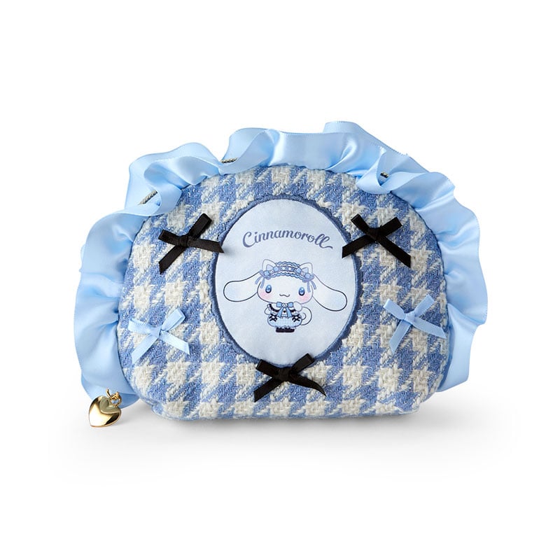 Close-up of the Cinnamoroll mini zipper pouch with ribbon accents and heart zipper pull