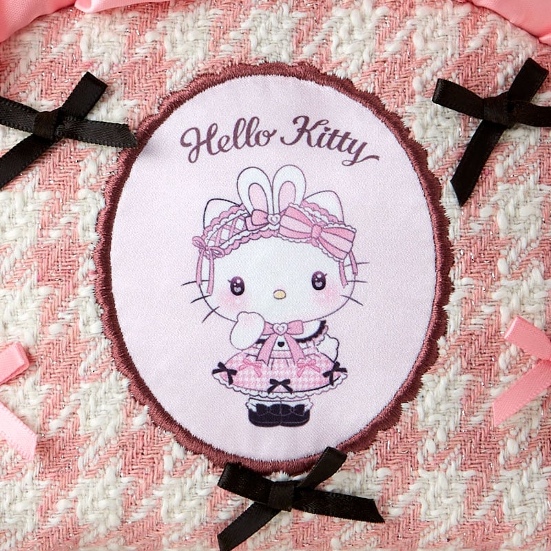 Hello Kitty mini zipper pouch with ruffled accents and heart zipper pull