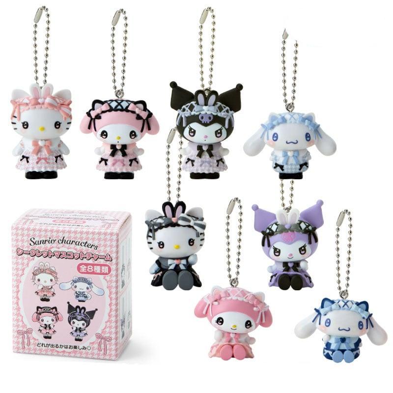 Close-up of Sanrio blind box plush charm with bunny ear crown on a textured handbag