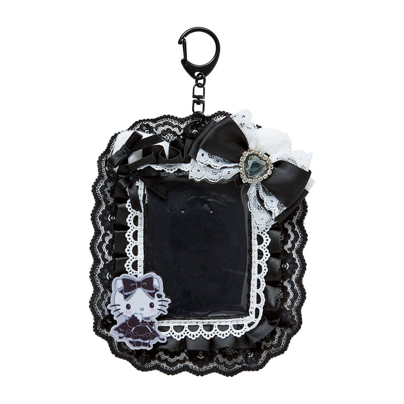 Close-up of retractable id badge holder with Gothic ruffles and Hello Kitty design