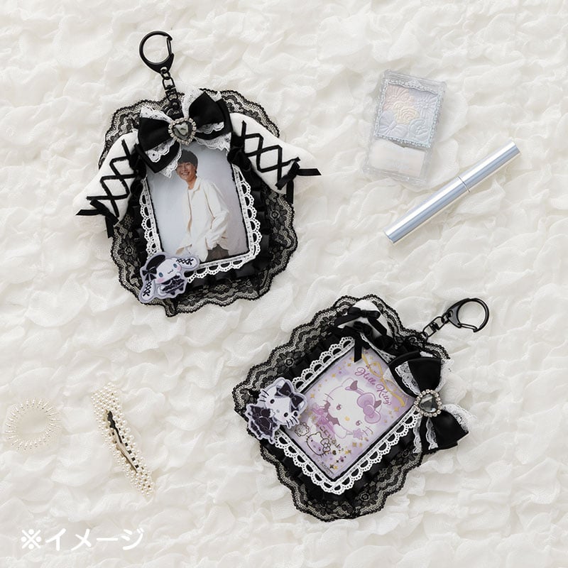 ID card badge holder shown attached to a black tote bag, ideal for daily use