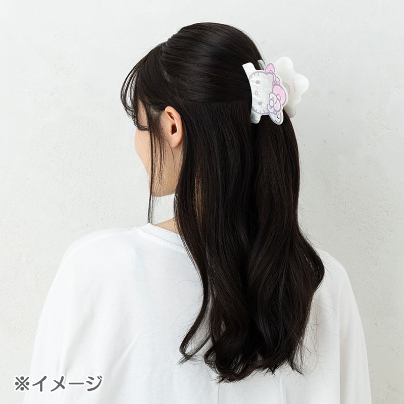 Close-up of the Hello Kitty ribbon hair clip with sparkling stones