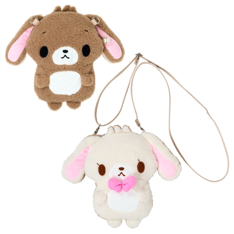 Sugarbunnies plush mini crossbody bag showcasing reversible design and pearl charm.