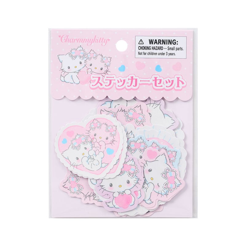 Close-up of Charmmy Kitty stickers in a kawaii style.