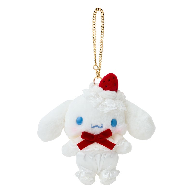 Front angle of Cinnamoroll plush keychain with strawberry and frosting detail.