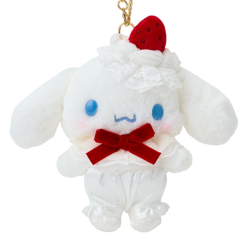 Side view showing the lobster clasp and ruffled edges of the Sanrio keychain.