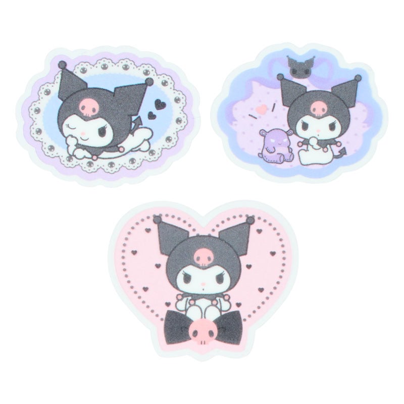 Display of adorable Kuromi stickers on a colorful notebook.