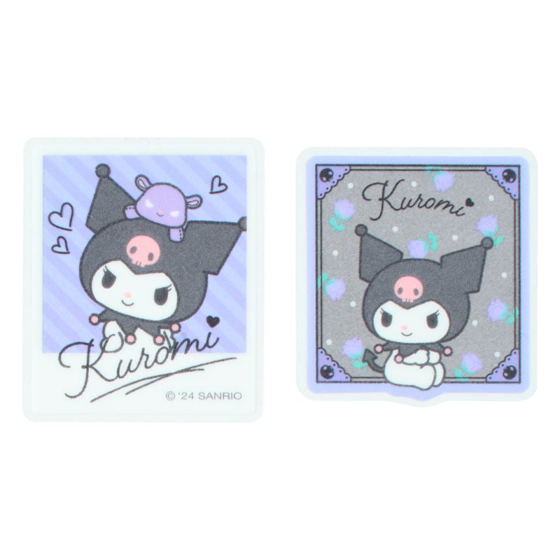 Creative setup with Kuromi stickers decorating a tech gadget.