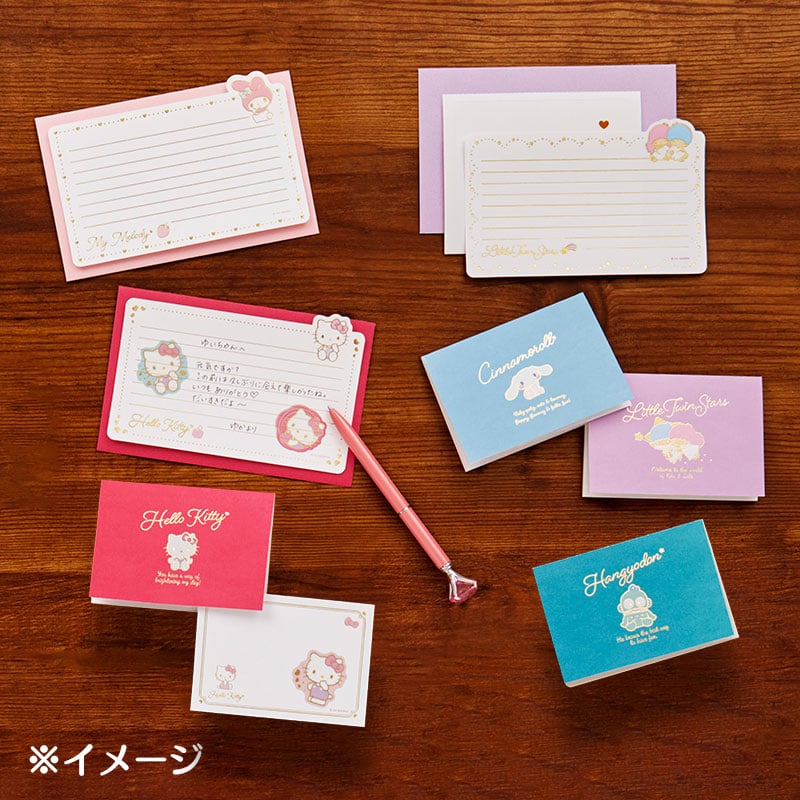 Cute stationery set with mini memo pads showcasing playful character designs.