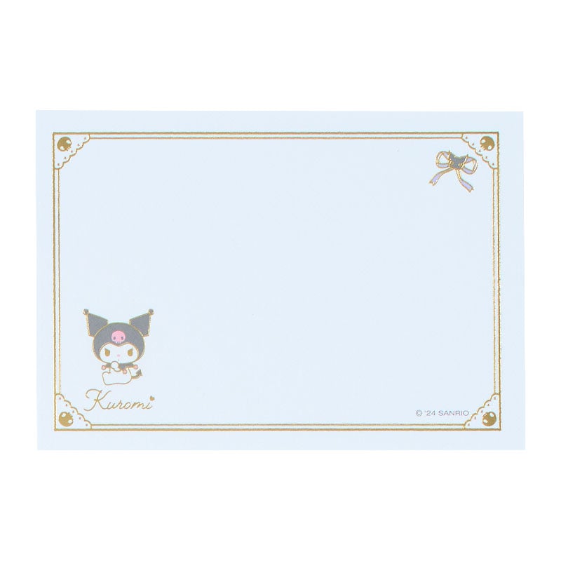 Close-up of Kuromi mini memo pads with gold foil accents.