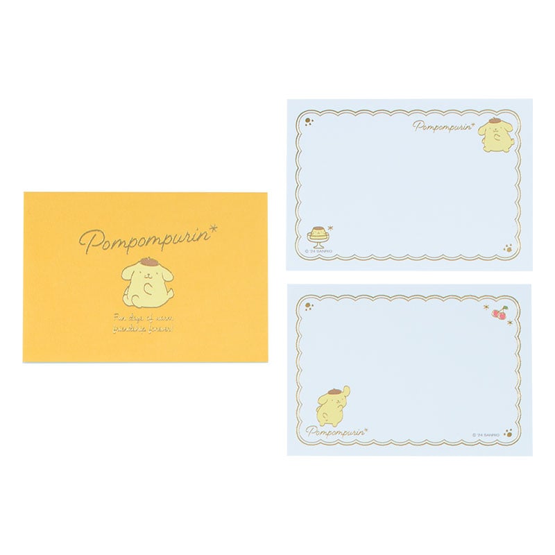 Set of 10 Sanrio memo pads stacked with one sheet featuring artwork
