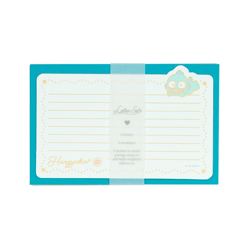 Close-up of Hangyodon letter set showing gold foil details and envelopes