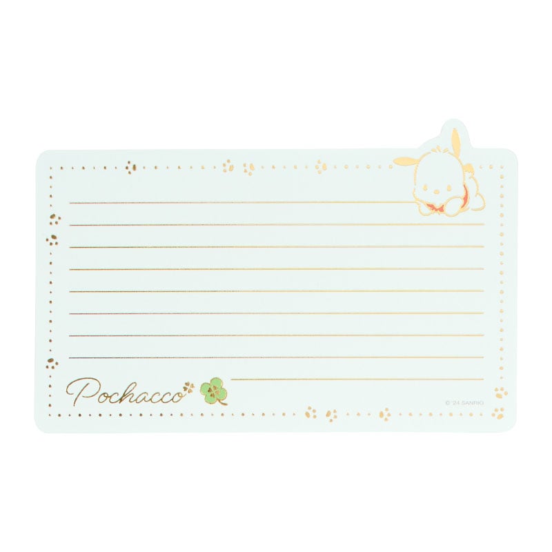 Hand holding a handwritten note with the cute letter writing set