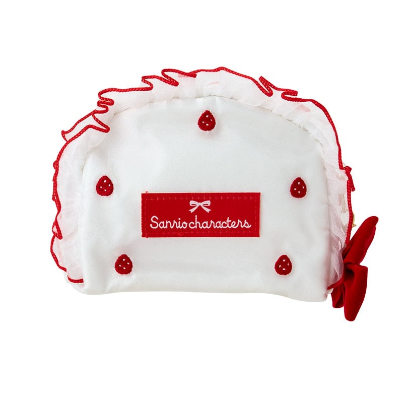 Side angle of small zipper pouch highlighting frill and applique details