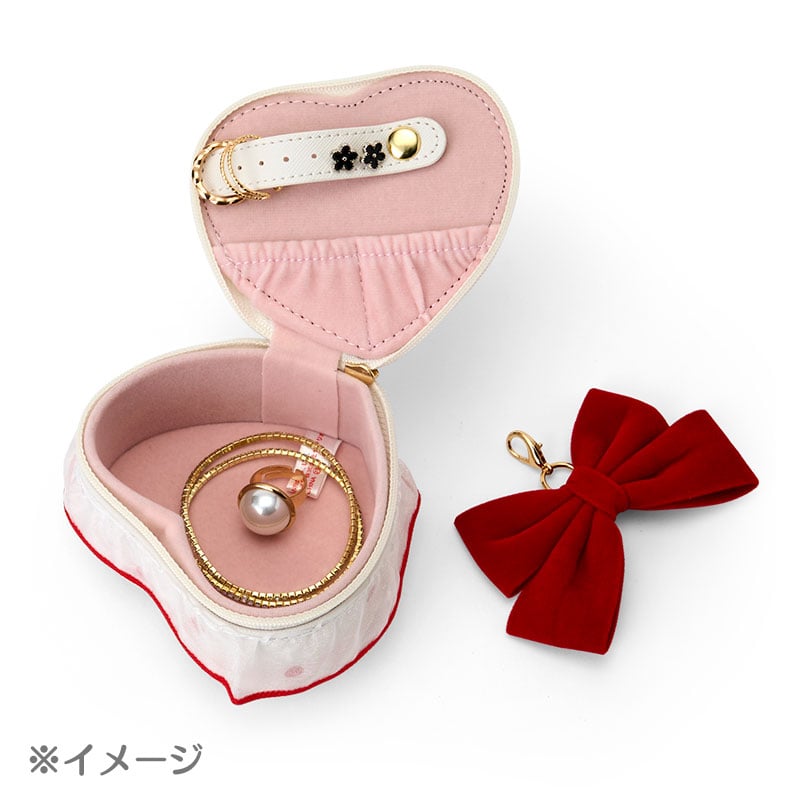 Front view of the Kuromi case with strawberry and ribbon charm detail