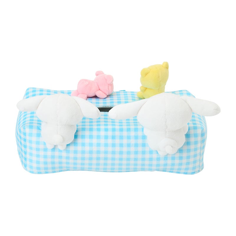 Tissue case styled as cinnamoroll party decorations on desk near birthday setup